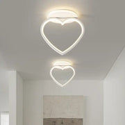 Modern white heart ceiling light with two led fixtures emitting a soft glow ideal for bedroom decorbites ceiling light