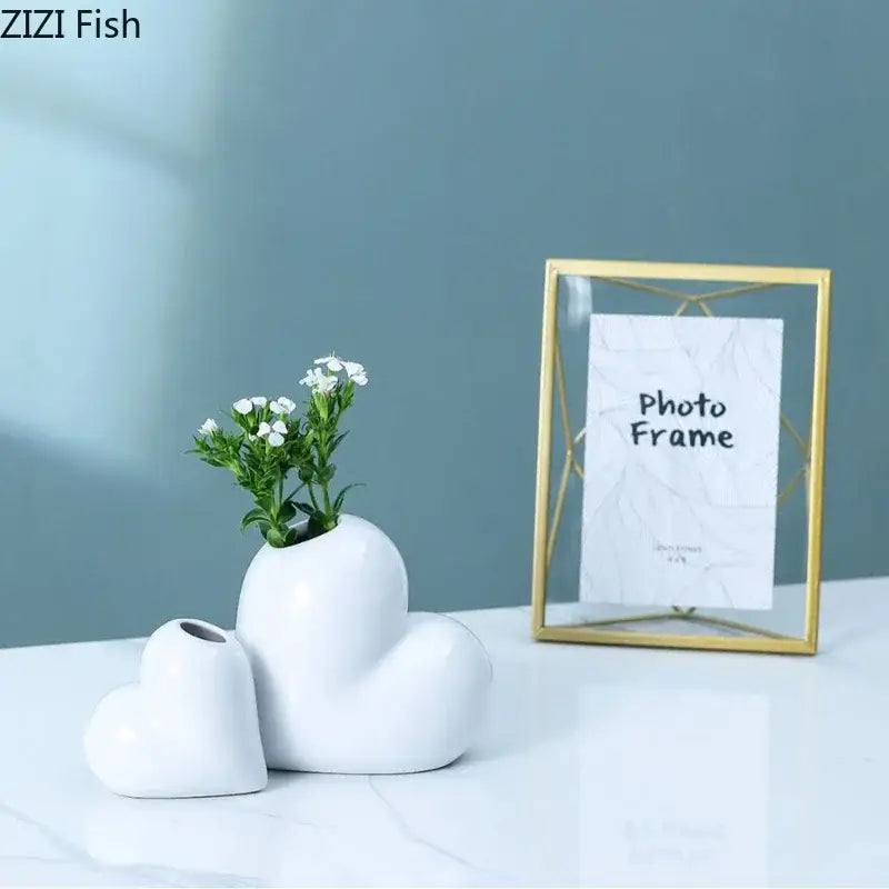 Modern white heart ceramic vase with small opening and artificial greenery for decorbites heart ceramic desk decor