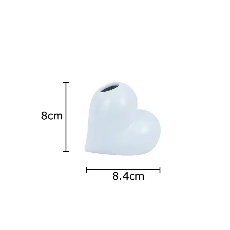 Modern white decorbites heart ceramic vase with smooth glossy finish and small opening for artificial greenery decor