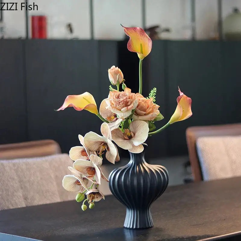 Black ribbed ceramic vase with peach and cream calla lilies roses and orchids for modern white heart ceramic decorbites vase