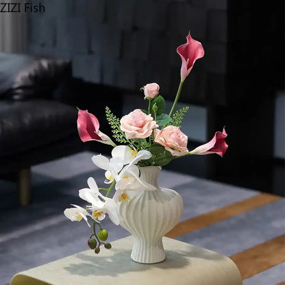 Modern white heart ceramic vase with vertical ridged detailing and pink calla lilies for living room decorbites heart ceramic