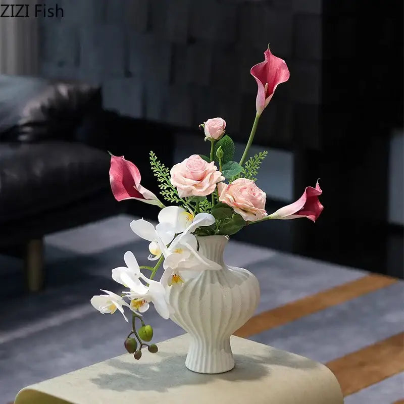 Modern white heart ceramic vase with vertical ridged detailing and pink calla lilies for living room decorbites heart ceramic