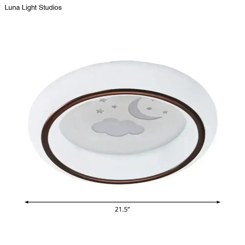 White ceiling light with bronze rim and frosted glass embossed with moon cloud star featuring hot air balloon design