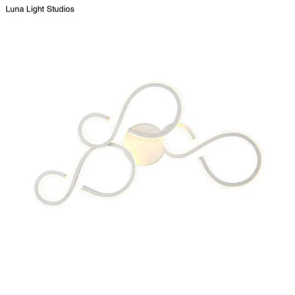 Modern white infinity spiral led light with sleek silver twisted wire design and warm glow bulb included for living room