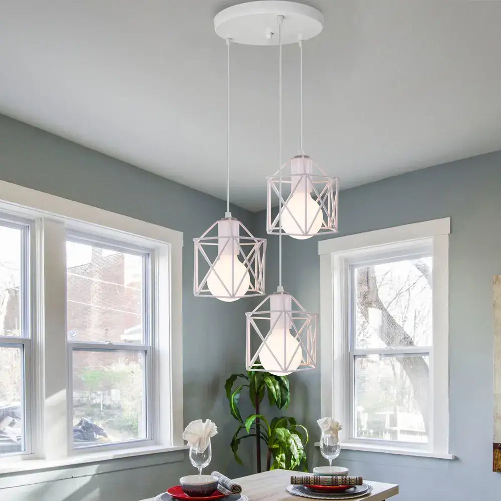 Three white modern iron cage pendant lights by decorbites hang from ceiling for kitchen and living room decor