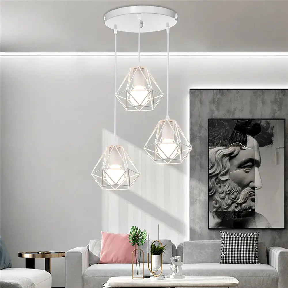 Three white modern iron cage pendant lights by decorbites with geometric design for kitchen and living room decor