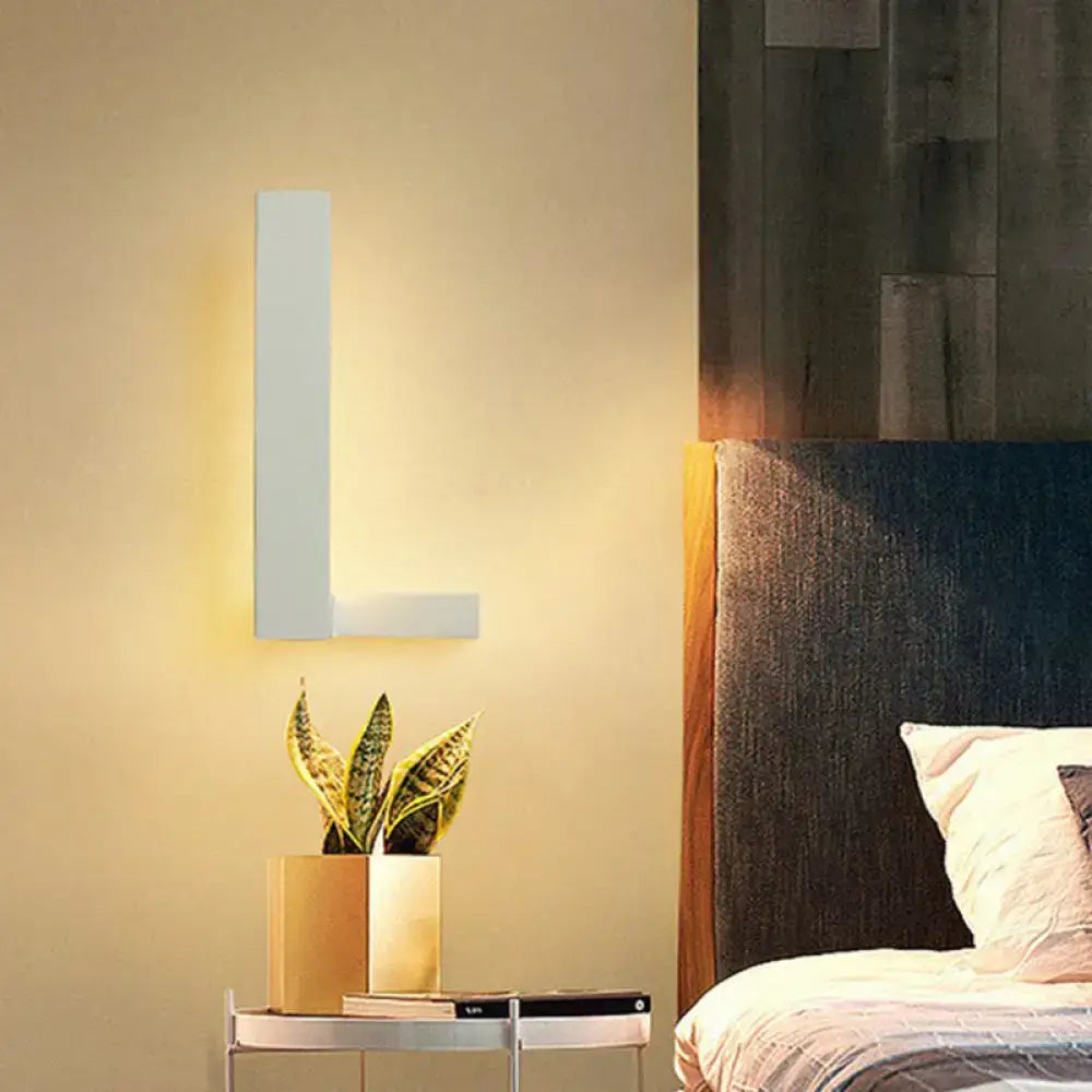 Modern white l-shaped led wall sconce with sleek minimalist design for living room geometric lighting