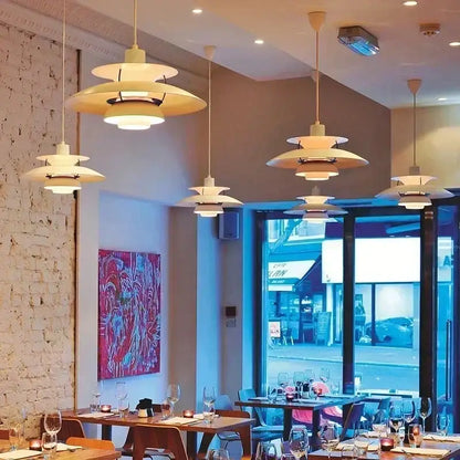 Cream-colored modern white layered led pendant light for kitchen features sleek layered design by decorbites colorful