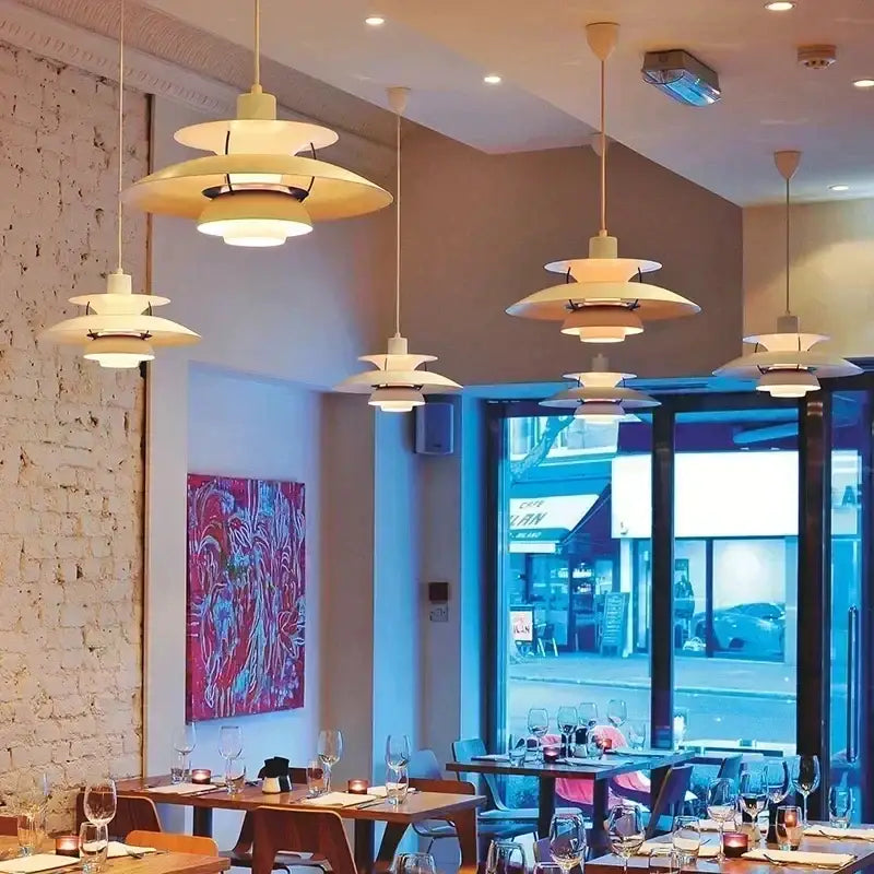 Cream-colored modern white layered led pendant light for kitchen features sleek layered design by decorbites colorful