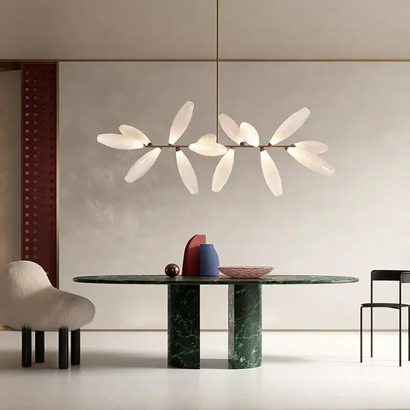 Modern white leaf shaped pendant light with sleek brass finish featuring decorbites elegant glass led for dining room decor