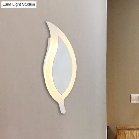 Modern white leaf wall lamp with a sleek frame and warm led lighting for bedroom use as a leaf wall lamp