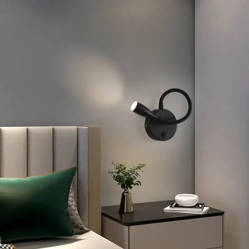 Black minimalist wall lamp with circular arm and adjustable spotlight for modern white led bedside wall decorbites led bedside use
