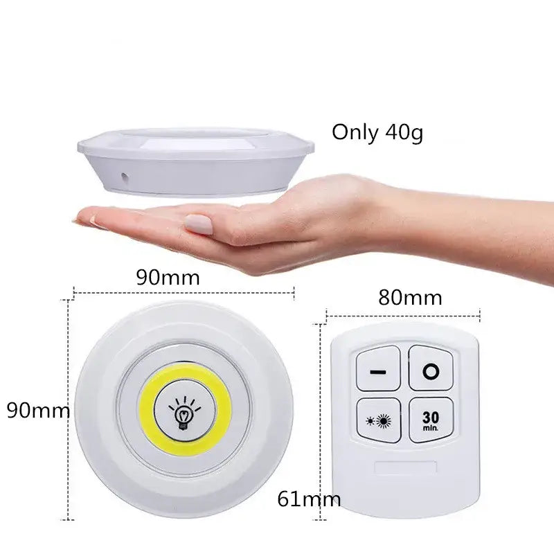 Modern white led cabinet light with remote control dimming featuring a solar-powered yellow button and matching remote control