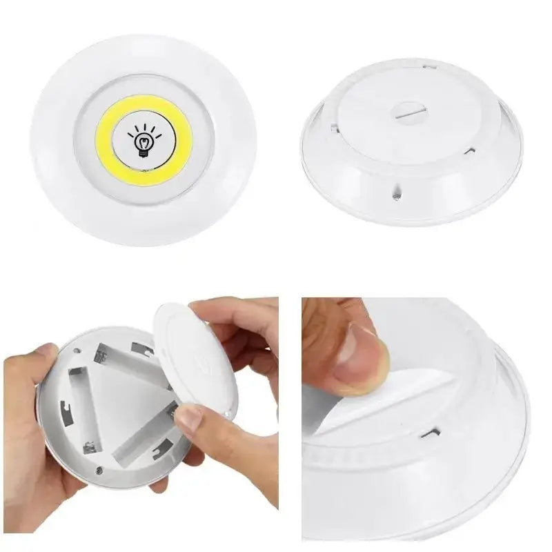 Modern white led cabinet light with remote control dimming featuring a yellow illuminated bulb and lightbulb icon center