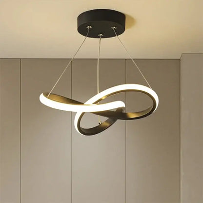Modern white led interlocking ring pendant light with black base and brushed gold accent helps create stylish dining room ambiance