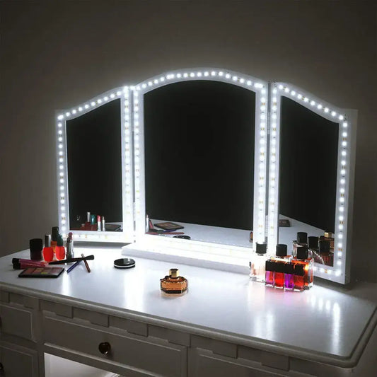 Modern white three-panel vanity mirror with led lights and vanity strip wall light for bathroom lighting