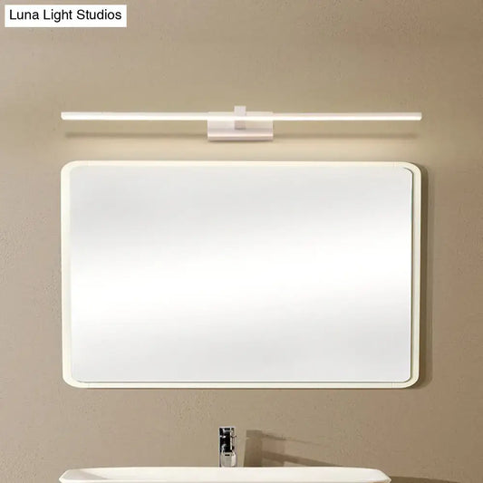 Modern white led wall light with warm white color temperature integrated above a rectangular bathroom mirror frame