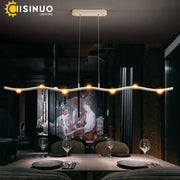 Modern white LED wave pendant light with sleek curved design and warm glowing bulbs for dining room decorbites decor