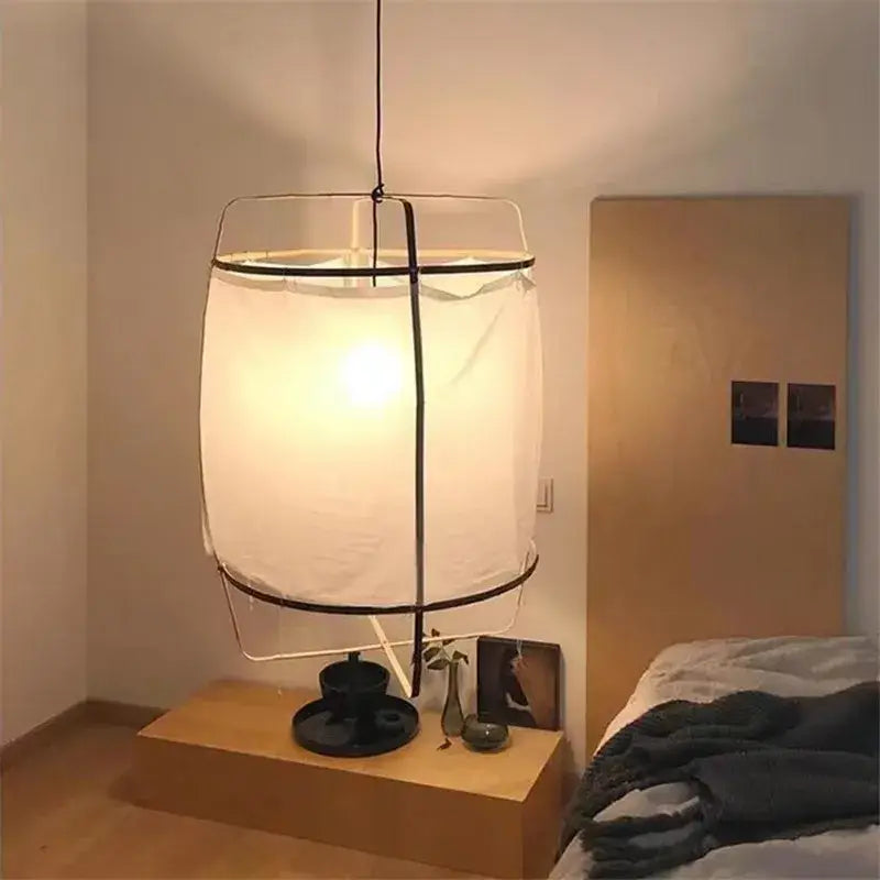 Modern white linen cotton pendant lamp with cylindrical fabric shade and black metal frame for kitchen island lighting
