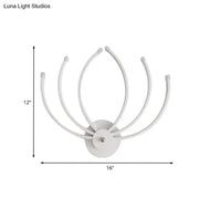 Modern white lotus wall sconce with curved spider-like arms and circular base for bedroom LED lighting