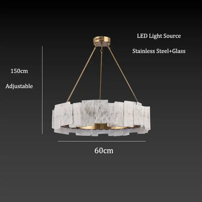 A modern gold-toned stainless steel circular pendant light with frosted cloud mist glass panels for dining room decorbites cloud mist