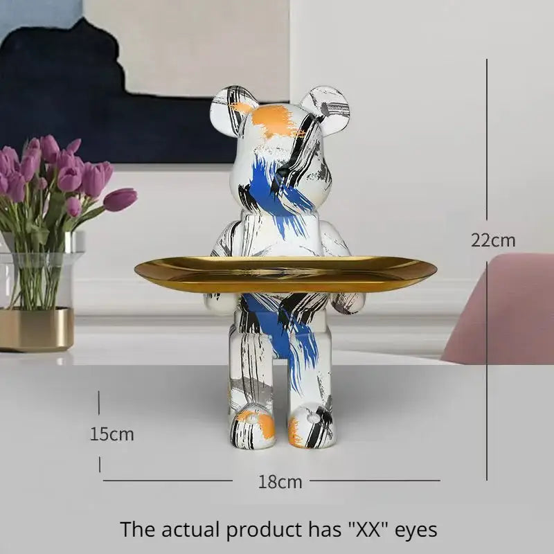 Modern white marble bear figurine sculpture painted in white blue and orange holding a gold tray for living room use