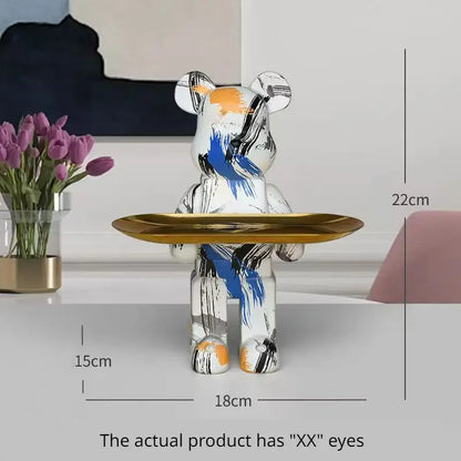 Modern white marble bear figurine sculpture painted in white blue and orange holding a gold tray for living room use