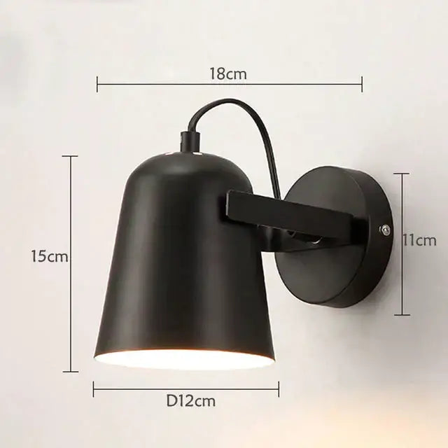Black matte ferrell wall lamp with adjustable arm and conical shade for modern bedroom spotlight use