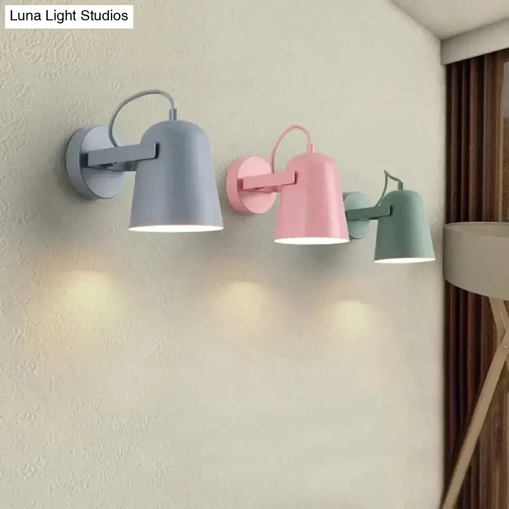Three pastel-colored modern white matte ferrell wall lamps with adjustable minimalistic design for bedroom spotlight use