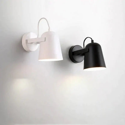 Modern white matte ferrell wall lamp with adjustable arms and cylindrical shades for bedroom spotlight lighting