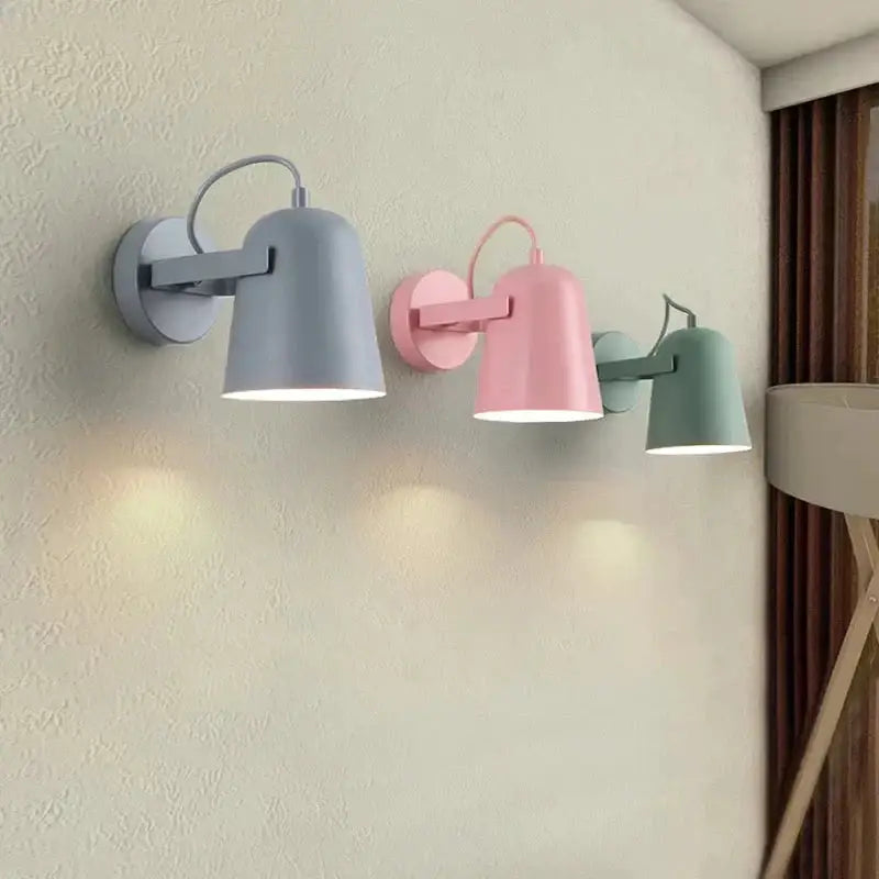 Pastel-colored ferrell wall lamp with matte metal shades in gray pink and mint green for modern bedroom lighting