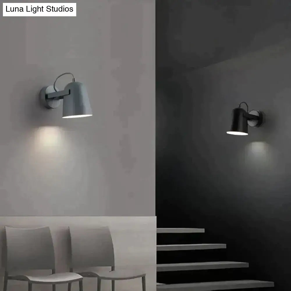Modern white matte ferrell wall lamp with adjustable sleek cylindrical shades in gray and black for bedroom spotlight
