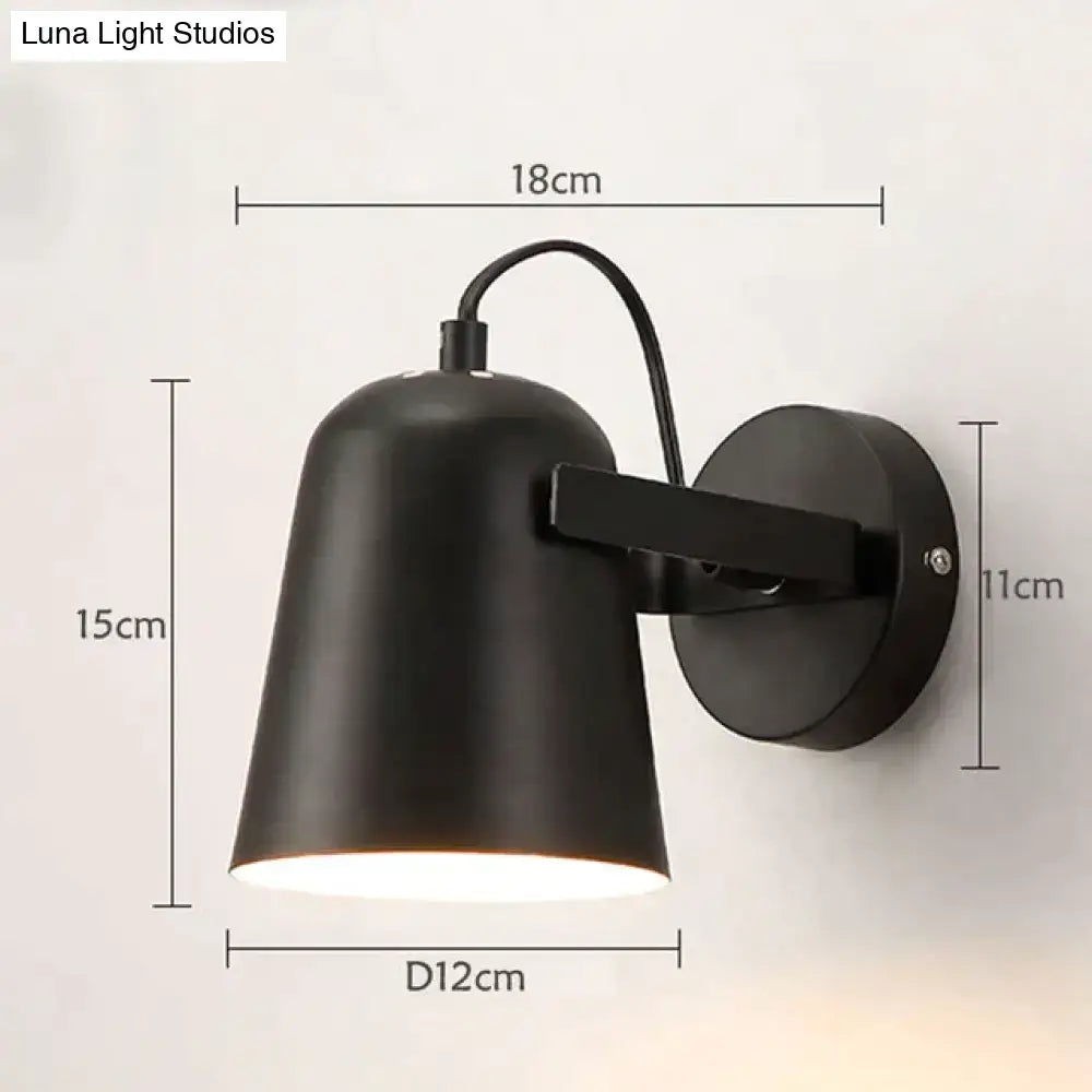 Black matte ferrell wall lamp with conical shade and adjustable arm for modern bedroom spotlight lighting