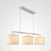 Decorbites modern white metal island light fixture with three beige fabric shades for kitchen use