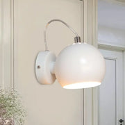 Modern white metal shade wall light with spherical matte finish and curved arm for bedroom 110v-120v fixture