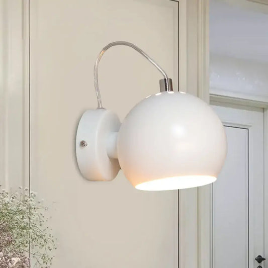 Modern white metal shade wall light with spherical matte finish and curved arm for bedroom 110v-120v fixture