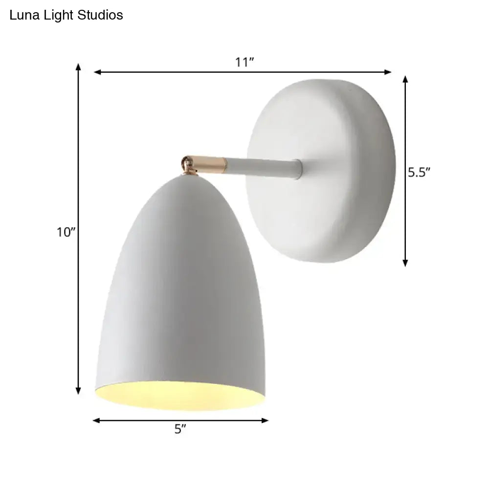 Modern white metal shade wall lighting featuring a white flare conical shade with brass accent for bedroom reading
