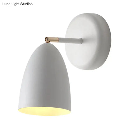 Modern white metal shade wall lighting with white flare finish and gold accent joint for bedroom reading lamp
