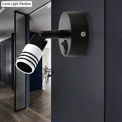 Modern white metal wall mounted led spotlight with cylindrical head and three stripes for bedroom reading light