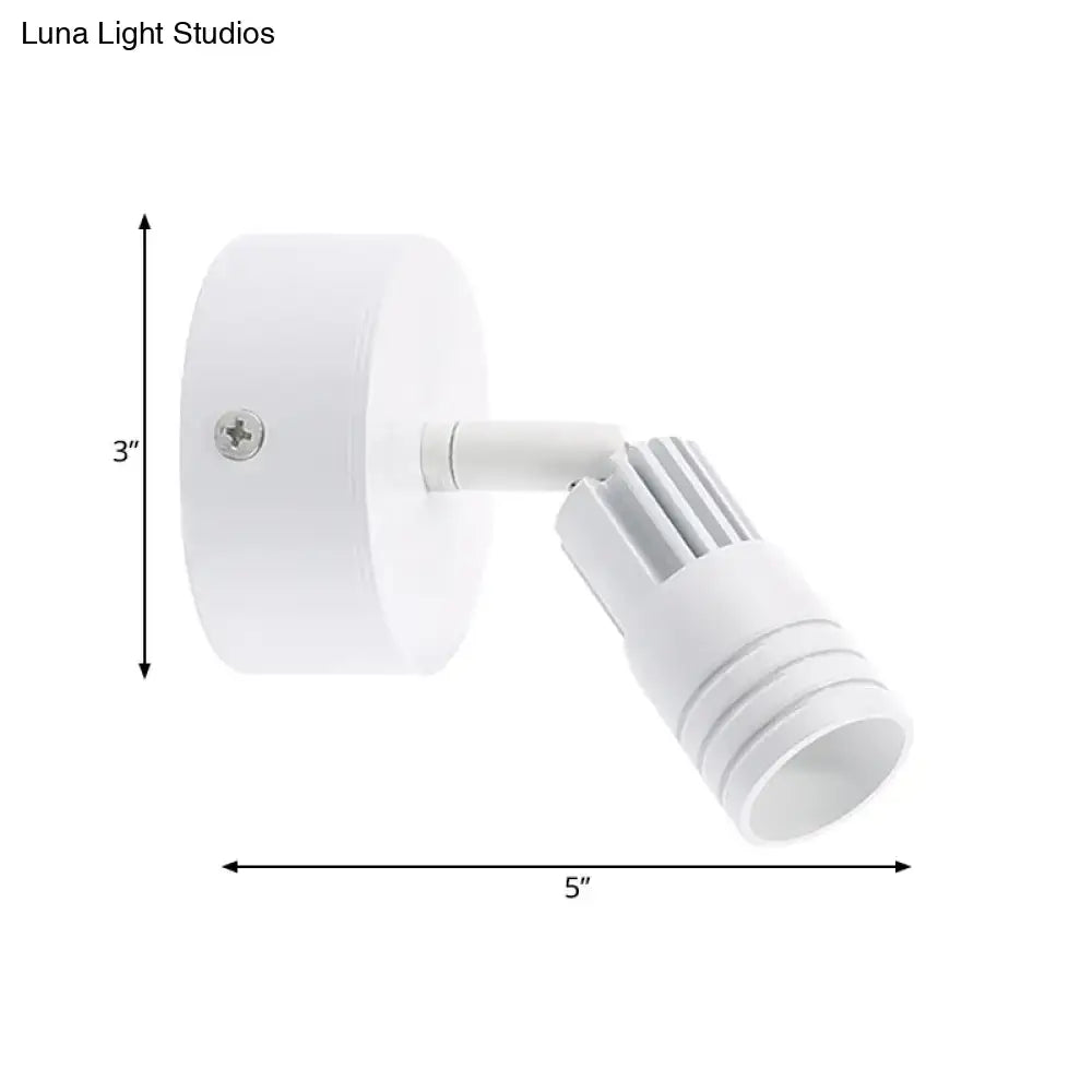 Modern white metal wall mounted led spotlight with adjustable arm for targeted illumination in bedroom reading light use fixture