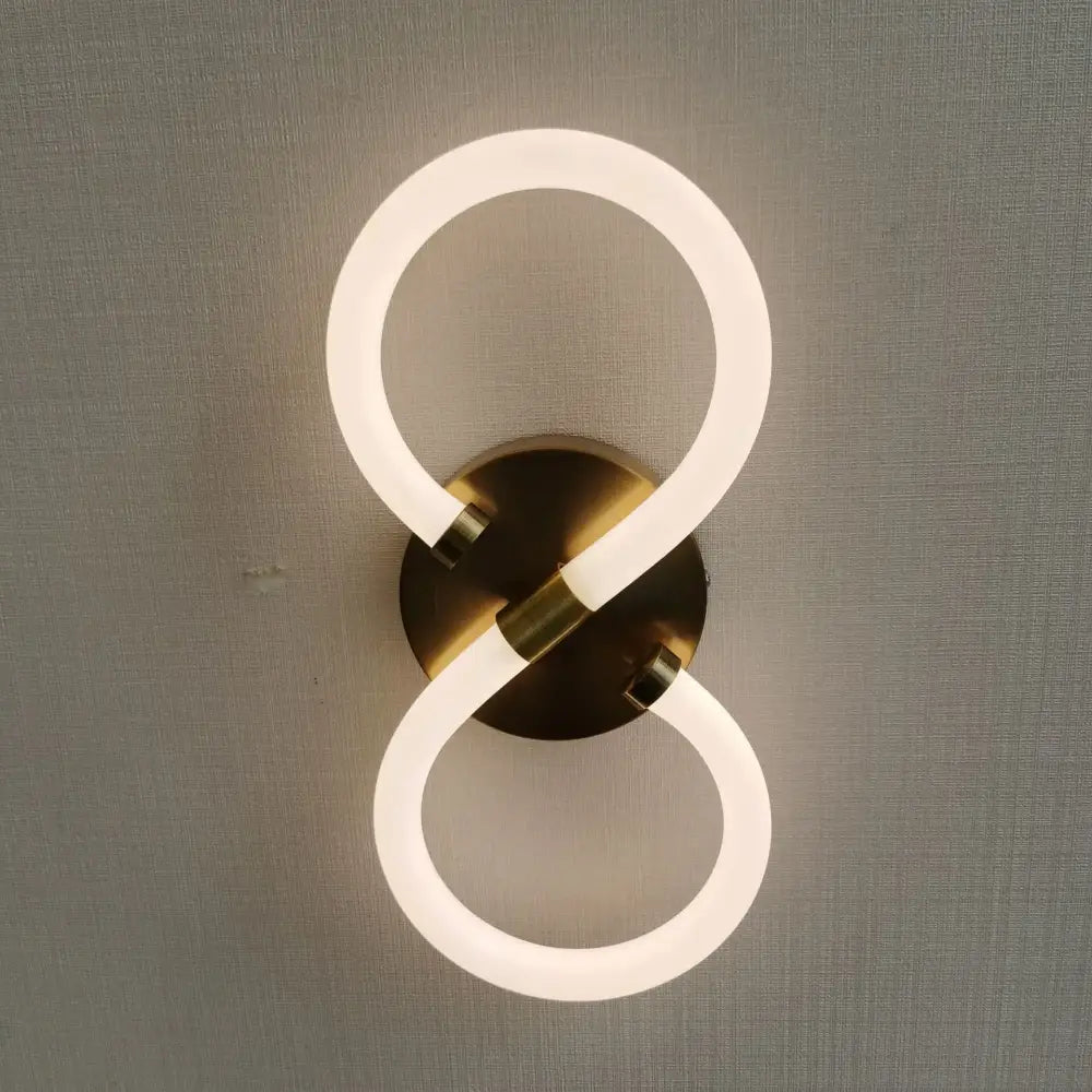 Modern white minimalist acrylic led wall lamp with infinity-shaped frosted white led tube and brushed brass base wall lamp