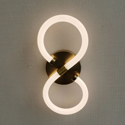 Modern white minimalist acrylic led wall lamp with infinity-shaped frosted white led tube and brushed brass base wall lamp