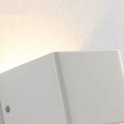 Modern white minimalist led wall lamp with sleek rectangular design ideal for living room or bedroom sconce lighting