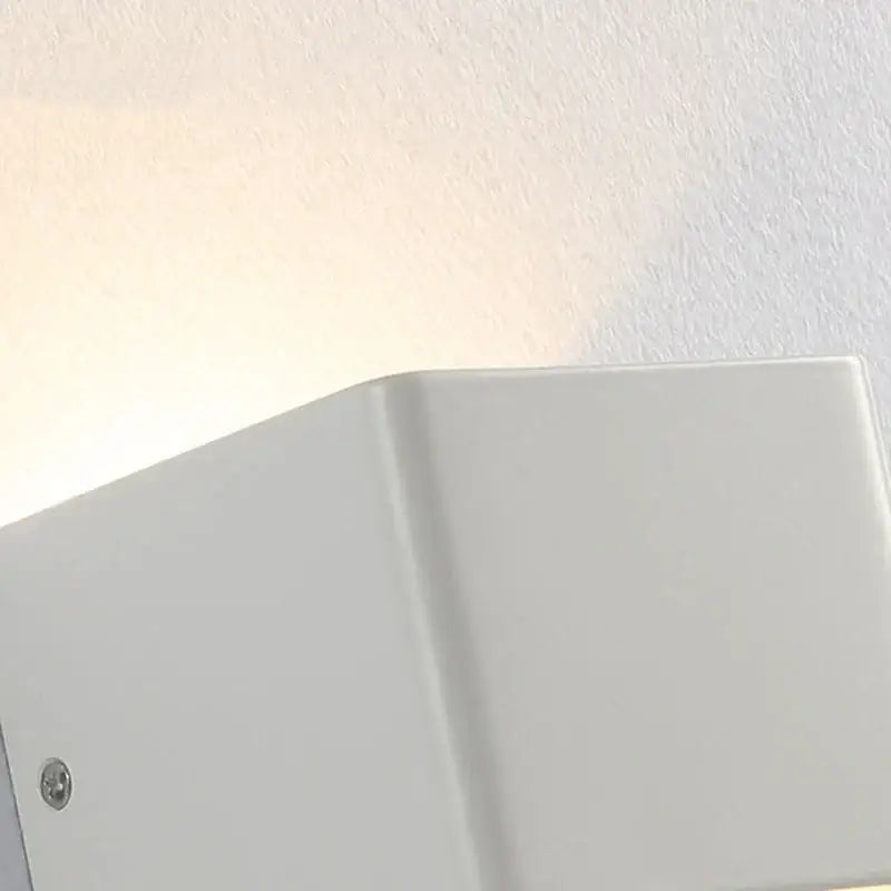 Modern white minimalist led wall lamp with sleek rectangular design ideal for living room or bedroom sconce lighting