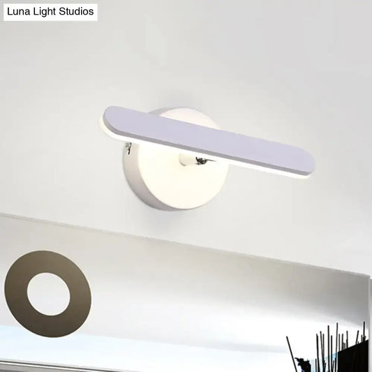 Modern white minimalist led wall light with smooth rounded edges providing natural warm light and maximum bulb wattage