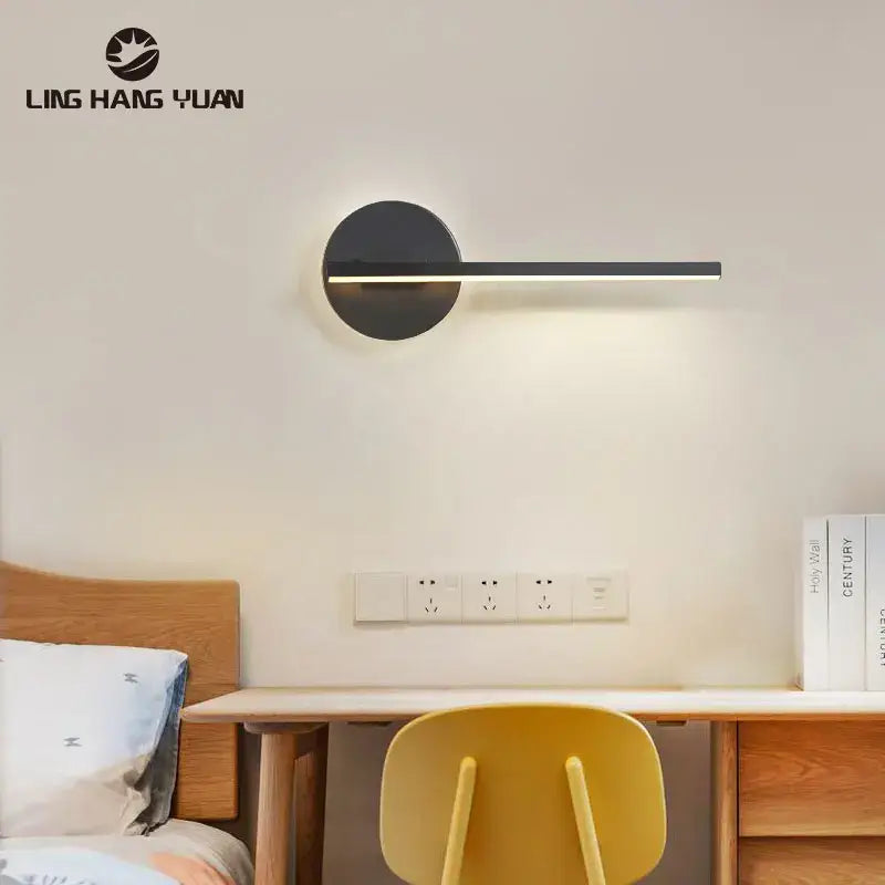 Modern white minimalist led wall sconce with black circular base and slim horizontal light bar for bedroom decorbites wall lamp