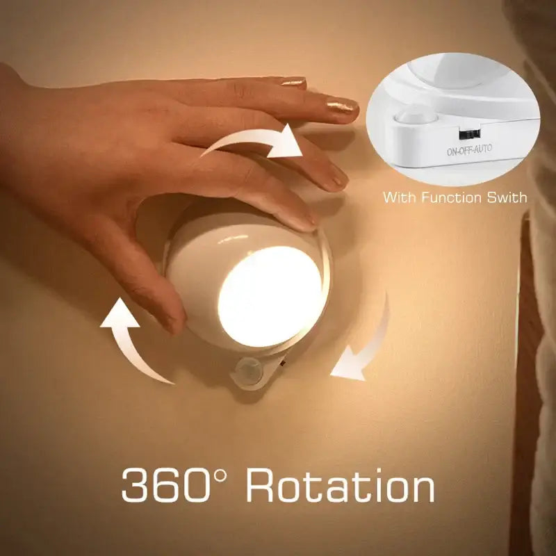 Modern white night light with rotating magnet and 360-degree rotation featuring on-off-auto function switch for bedroom use