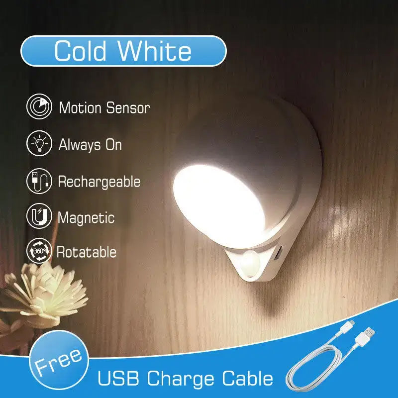 Modern white motion sensor night light with rotating magnet design rechargeable via usb for bedroom use