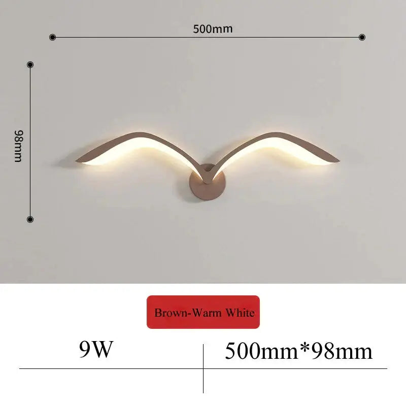 Brown wall lamp with nordic avian style wing design and warm white illumination for indoor bedroom use