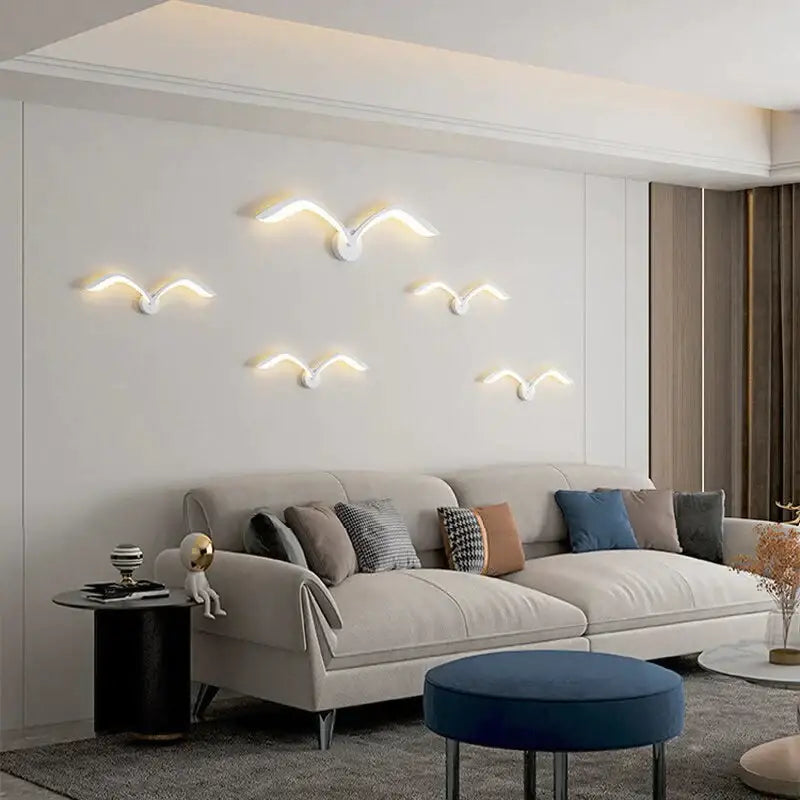 Modern white nordic avian style wall lamp featuring seagull-shaped warm curved light fixtures for indoor use